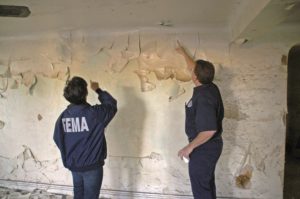 fema inspecting lead paint wall
